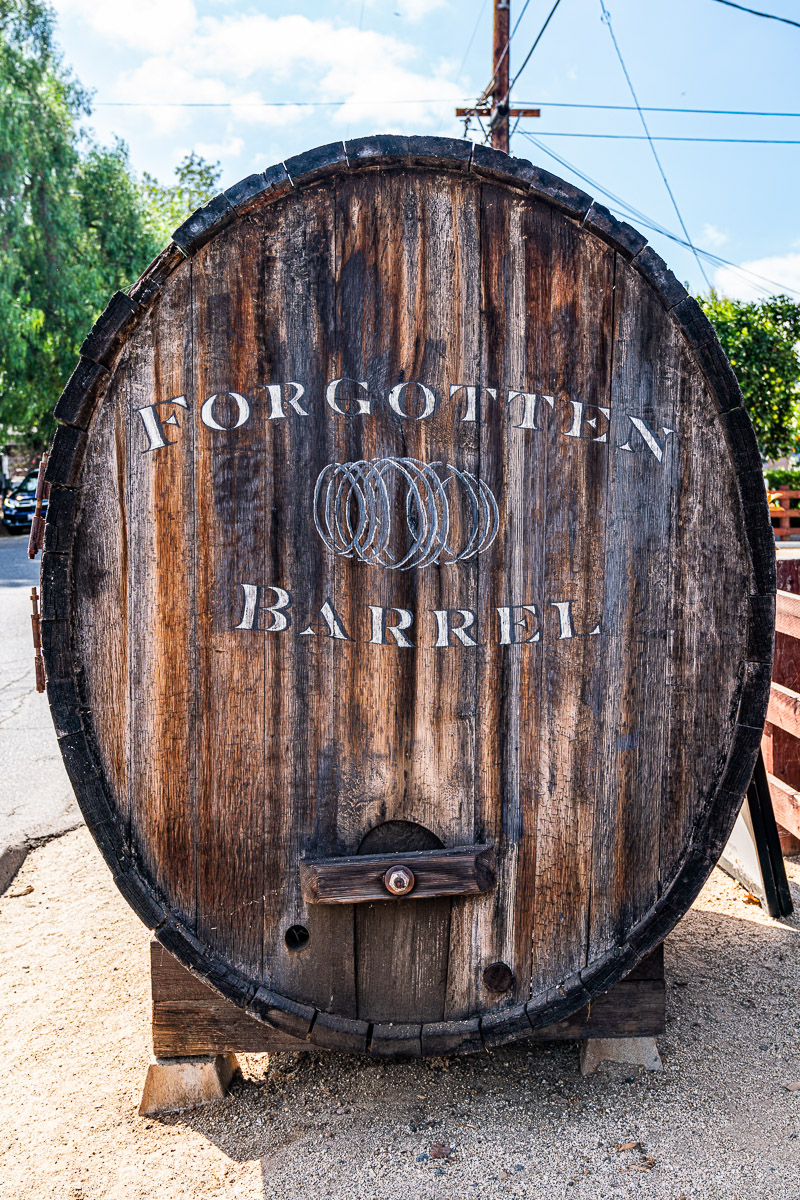 An old wine barrel with the words forgotten barrel on it